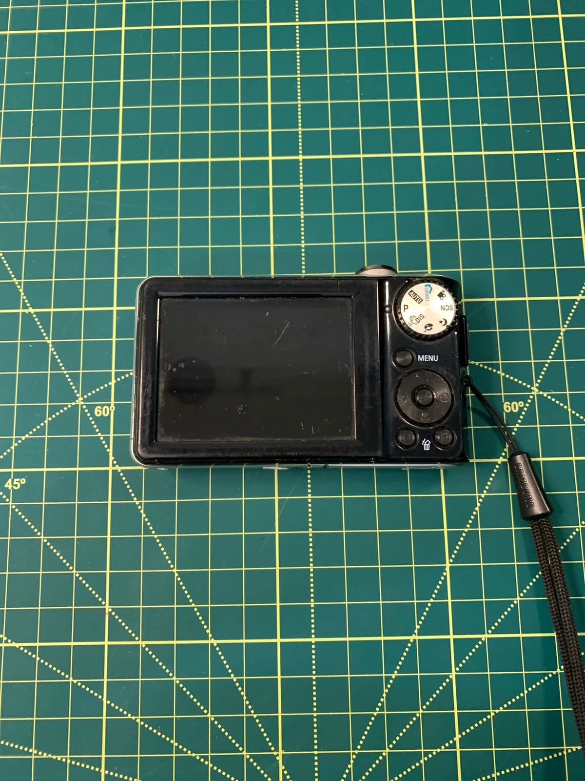 Câmera Digital PL100 — verso